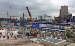 Modular scaffold used in constructing an independent pedestrian bridge.