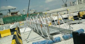 Modular scaffold used in constructing an independent pedestrian bridge.